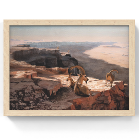 Framed artwork of a desert landscape with animals