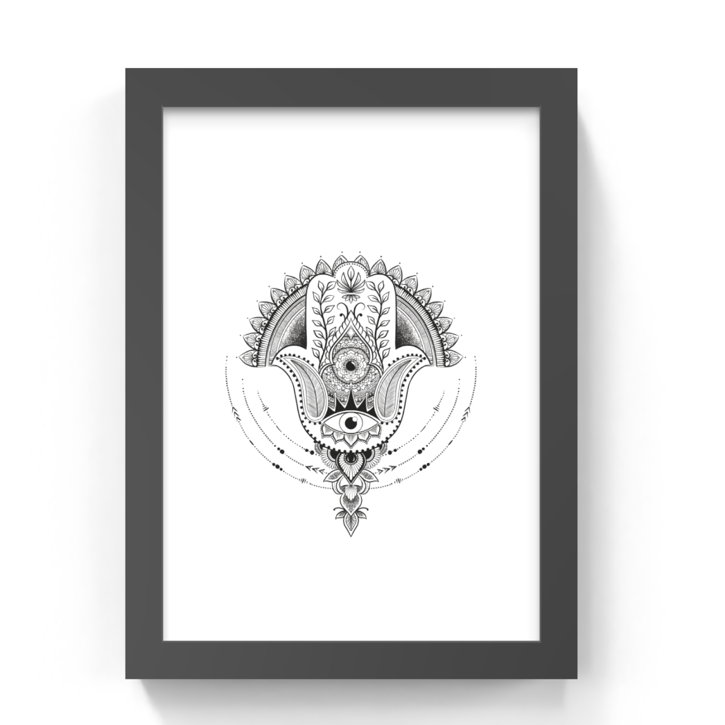 A framed black and white art print featuring a detailed hamsa hand illustration with an eye of providence, set in a dark gray frame against a white background.