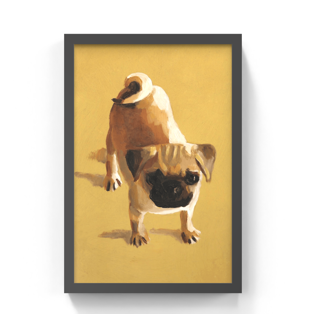 A framed art print featuring a stylized painting of a pug dog on a warm mustard-yellow background, displayed against a clean white wall.