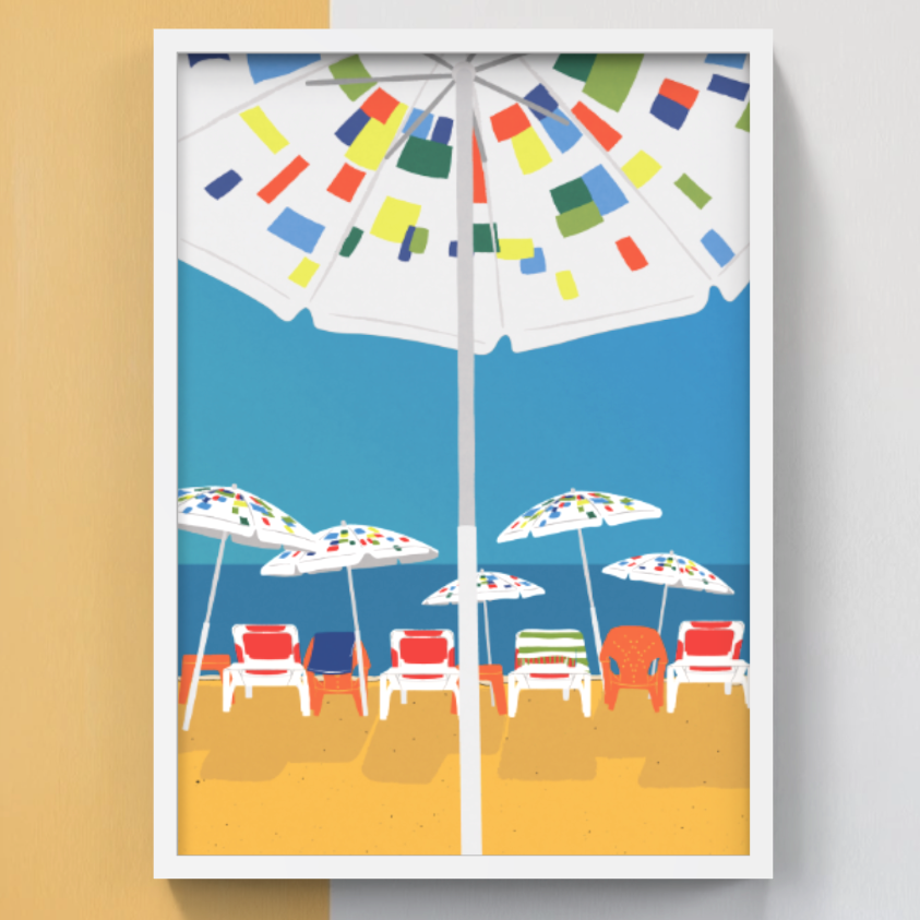 Framed artwork of the Tel Aviv beach scene with colorful umbrellas and chairs on a blue sky and yellow sand background.