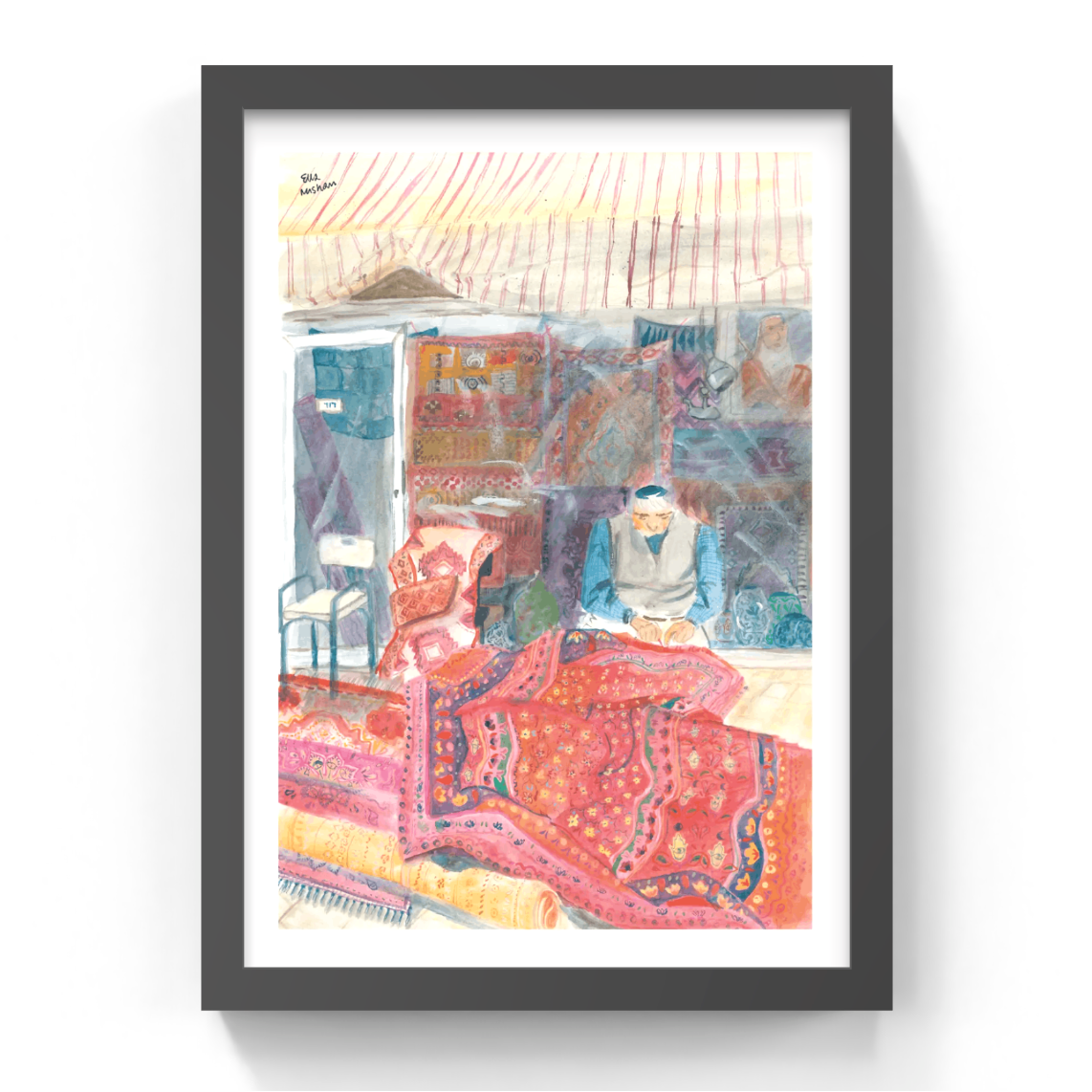 framed art of a persian man making rugs in israel